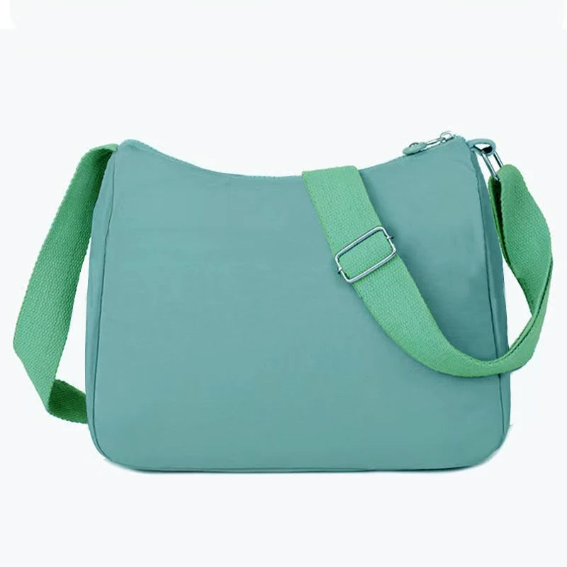 Neutral style men's and women's nylon crossbody bag for casual wear, fashionable canvas bag for women's shoes.