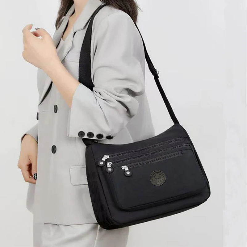 Neutral style men's and women's nylon crossbody bag for casual wear, fashionable canvas bag for women's shoes.