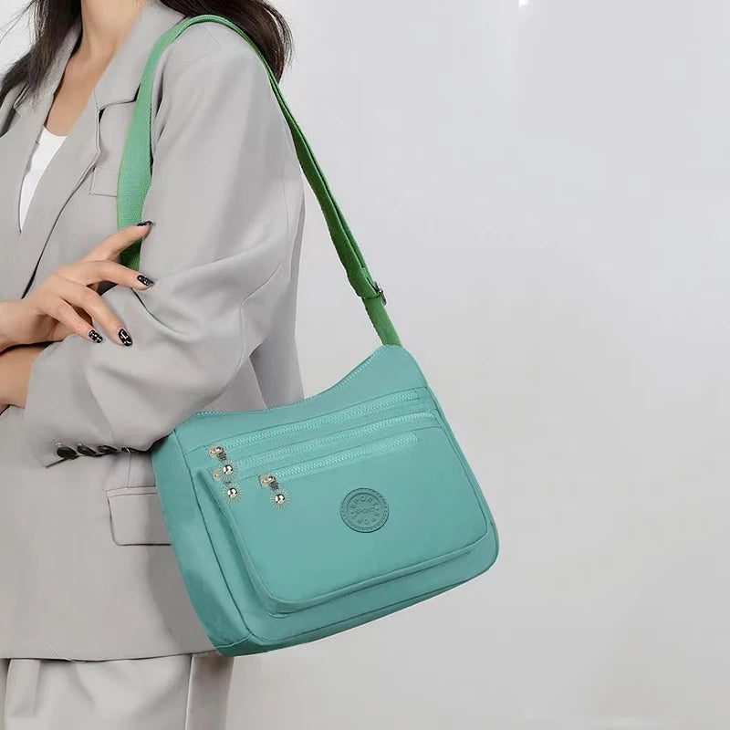 Neutral style men's and women's nylon crossbody bag for casual wear, fashionable canvas bag for women's shoes.